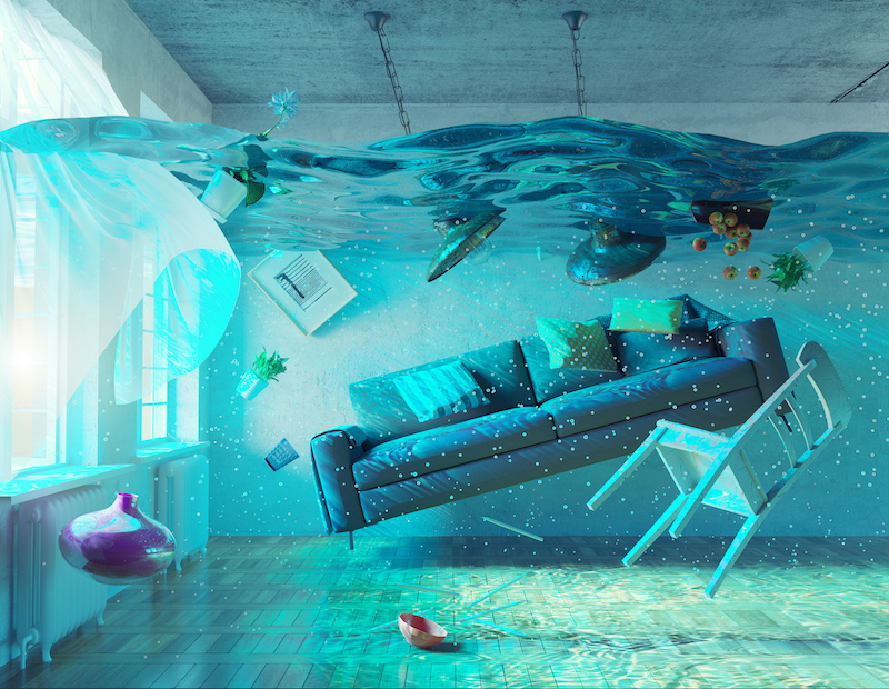 a picture of an apartment depicting it;s furnishing being underwater
