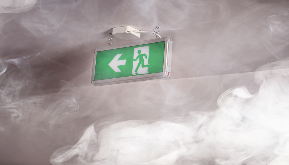 escape sign on the route of exit in a building