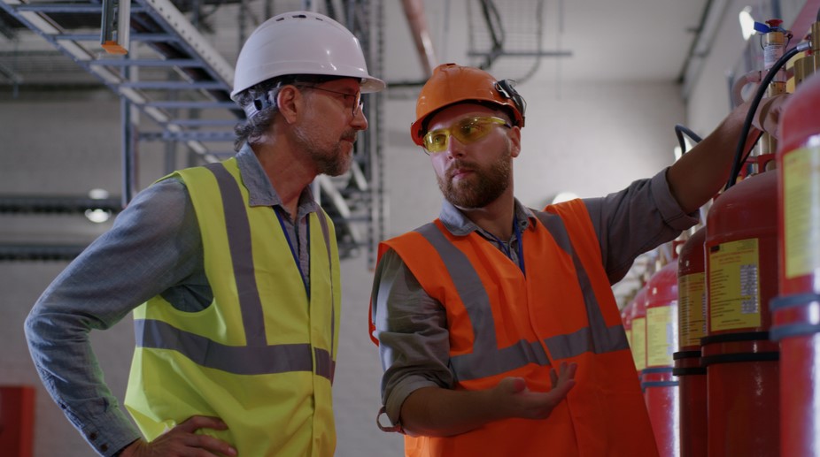 workers near gas cylinders
