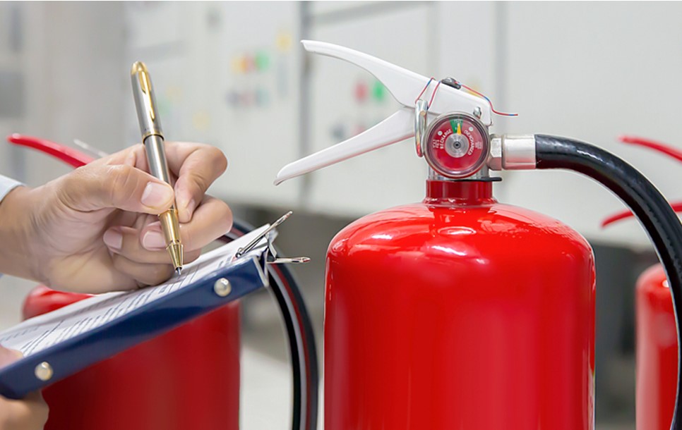 inspecting fire extinguisher