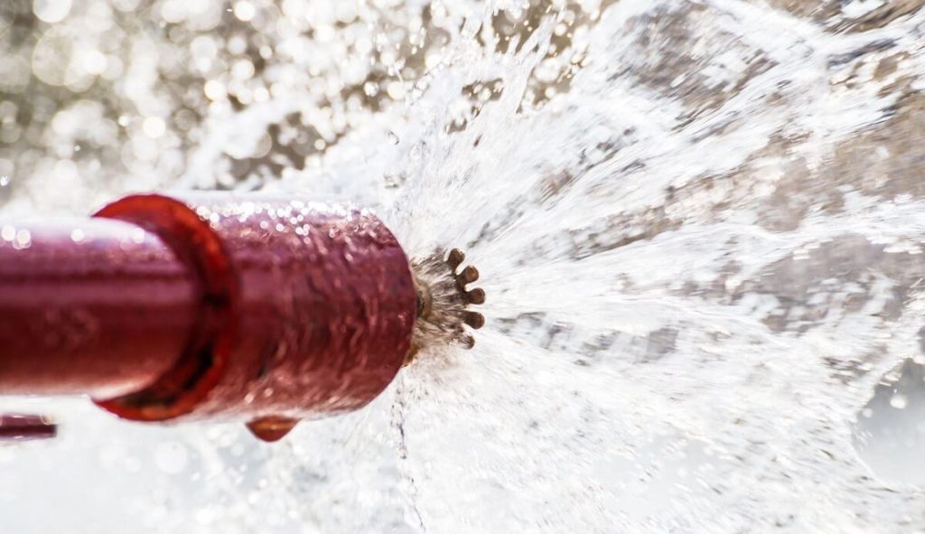 Red fire sprinkler pipe leaking
