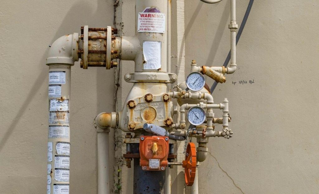 Old, rusty fire sprinkler system